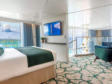 Legend of the Seas Royal Loft Suite (RL) bedroom, photo 1 of 4