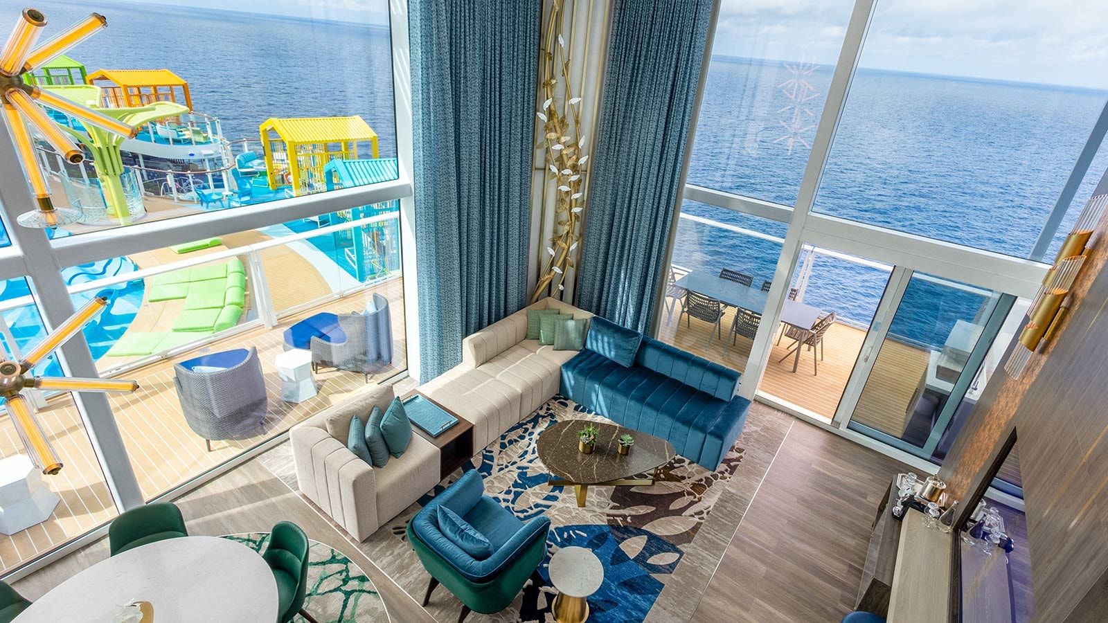 Legend of the Seas Royal Loft Suite (RL) living area, photo 3 of 9