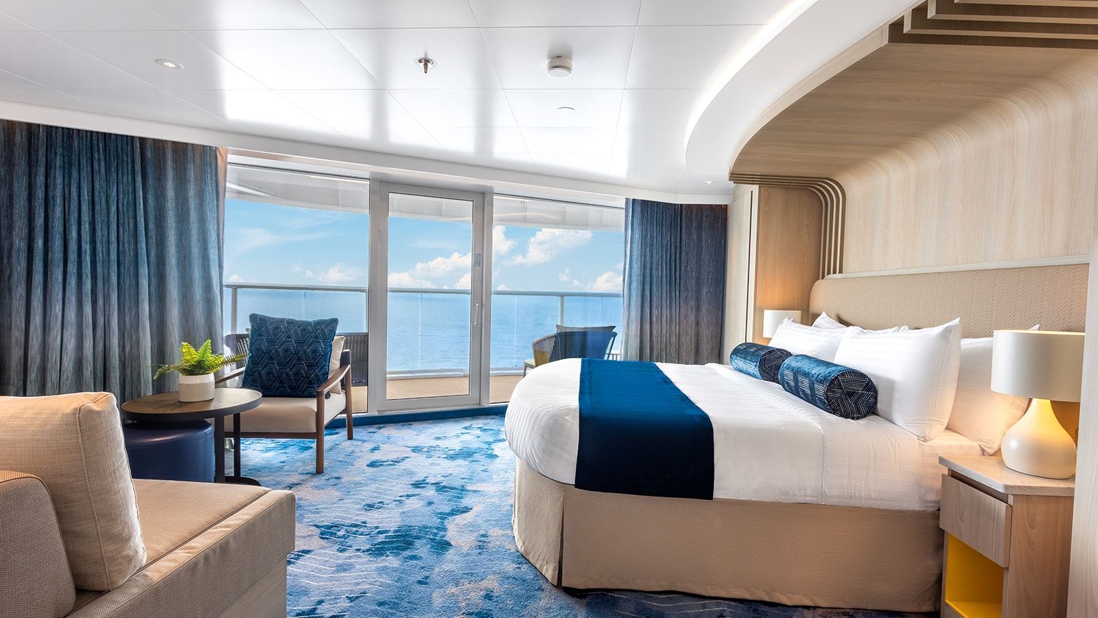 Hero of the Seas Sunset Corner Suite (SN) bedroom, photo 2 of 5