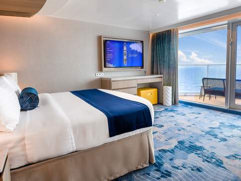 Legend of the Seas Sunset Suite (SS) bedroom, photo 2 of 5