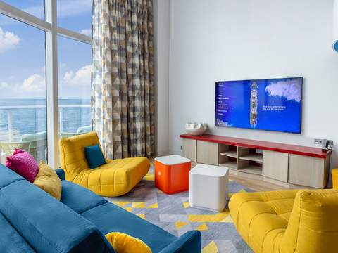 Legend of the Seas Ultimate Family Townhouse (UL) living area, photo 4 of 13