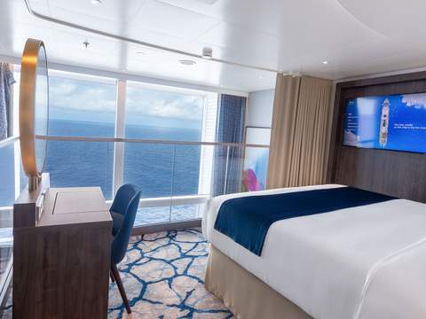 Icon of the Seas Icon Loft Suite (IL) bedroom, photo 1 of 2