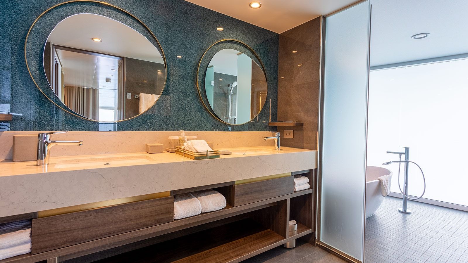 Icon of the Seas Royal Loft Suite (RL) bathroom, photo 1 of 3