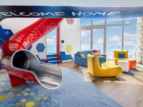 Icon of the Seas Ultimate Family Townhouse (UL) living area, photo 3 of 13