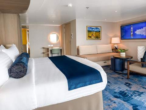 Icon of the Seas Sunset Corner Suite (SN) bedroom, photo 7 of 7