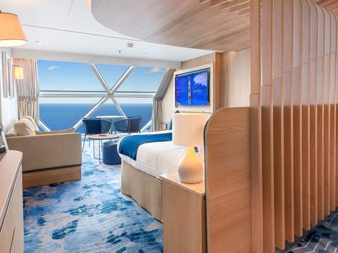 Icon of the Seas Ocean View Panoramic Suite (No Balcony) (VP) bedroom, photo 1 of 3