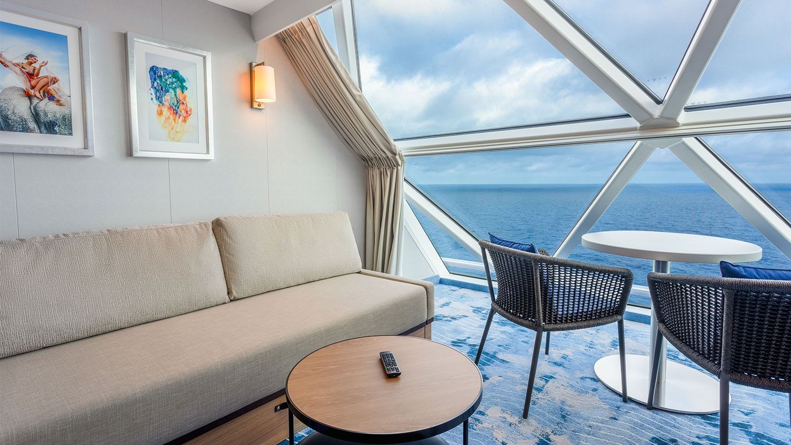 Icon of the Seas Ocean View Panoramic Suite (No Balcony) (VP) living area, photo 2 of 2