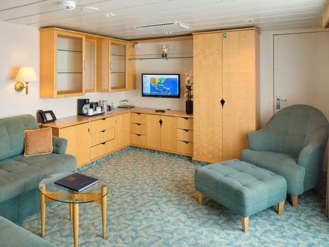 Independence of the Seas Grand Suite - 2 Bedroom (GT) living area, photo 1 of 2