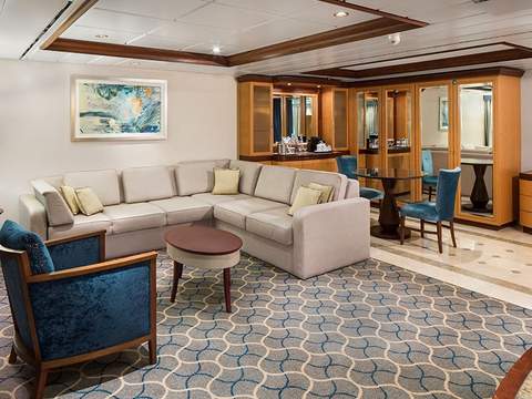 Jewel of the Seas Owner's Suite - 1 Bedroom (OS) living area, photo 1 of 3
