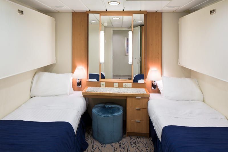 Jewel of the Seas Ocean View Suite - 2 Bedroom (No Balcony) (VT) bedroom, photo 2 of 3