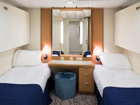 Jewel of the Seas Ocean View Suite - 2 Bedroom (No Balcony) (VT) bedroom, photo 2 of 3