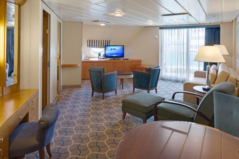 Jewel of the Seas Owner's Suite - 2 Bedroom (OT) living area, photo 3 of 4