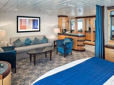 Liberty of the Seas Grand Suite - 1 Bedroom (GS) living area, photo 1 of 6