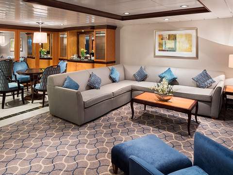 Liberty of the Seas Owner's Suite - 1 Bedroom (OS) living area, photo 1 of 3