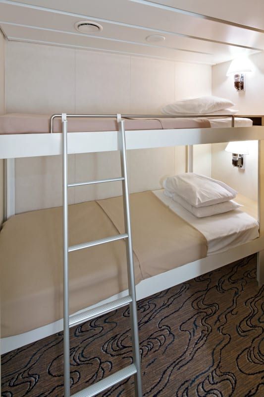 Navigator of the Seas Ocean View Panoramic Suite (No Balcony) (VP) bedroom, photo 1 of 3