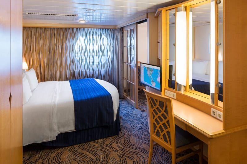 Navigator of the Seas Grand Suite - 2 bedroom (GT) bedroom, photo 3 of 4