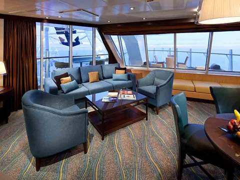 Oasis of the Seas Spacious AquaTheater Suite Lg Balcony - 2 Bedrooms (A1) living area, photo 1 of 2