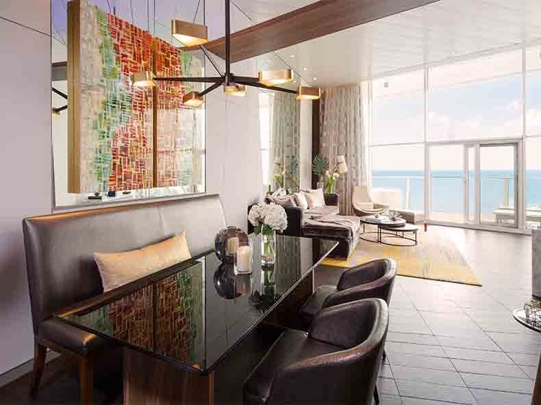 Oasis of the Seas Owner’s Panoramic Suite - 1 Bedroom (OP) dining area, photo 1 of 3