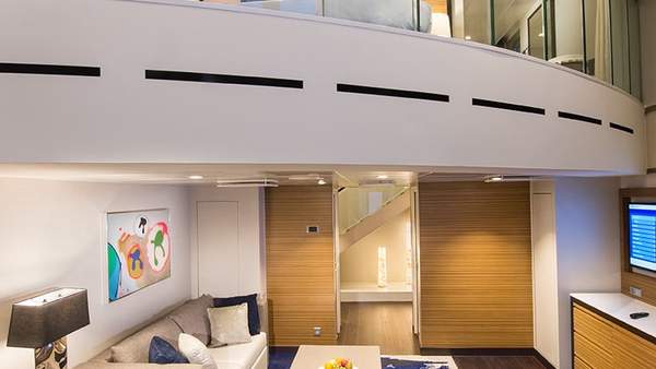 Odyssey of the Seas Grand Loft Suite (GL) living area, photo 1 of 2