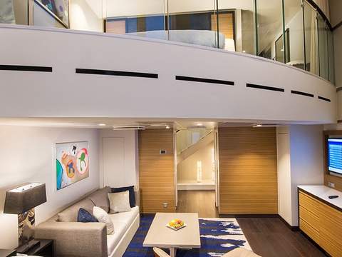 Odyssey of the Seas Grand Loft Suite (GL) living area, photo 1 of 2