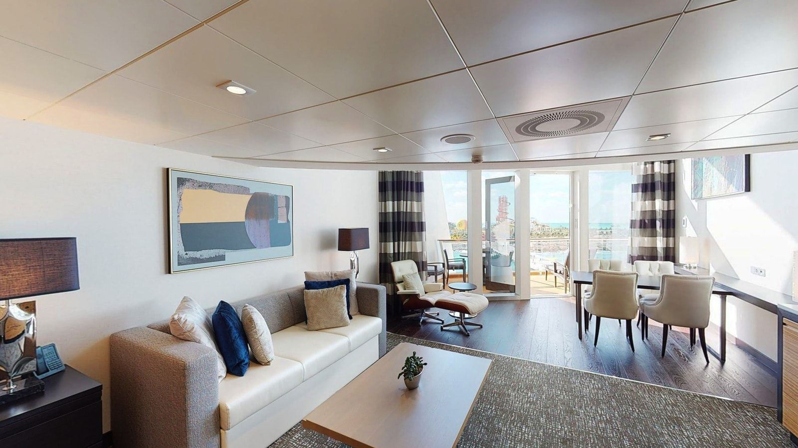 Odyssey of the Seas Owner's Loft Suite (OL) living area, photo 1 of 5