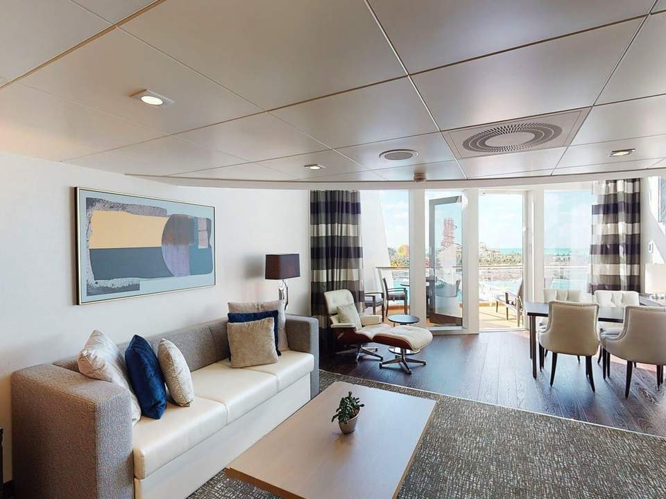 Odyssey of the Seas Owner's Loft Suite (OL) living area, photo 1 of 5