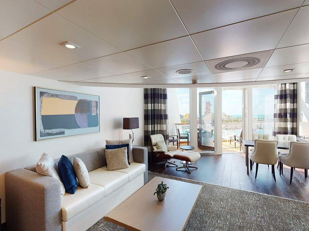 Odyssey of the Seas Owner's Loft Suite (OL) living area, photo 1 of 5