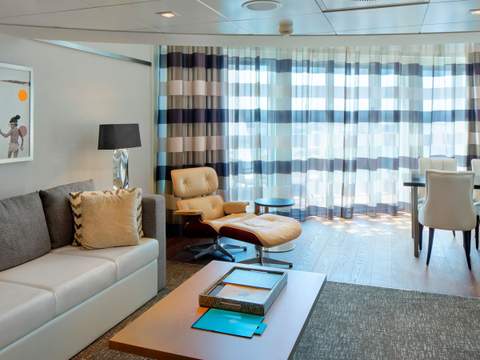 Odyssey of the Seas Owner's Loft Suite (OL) living area, photo 4 of 5