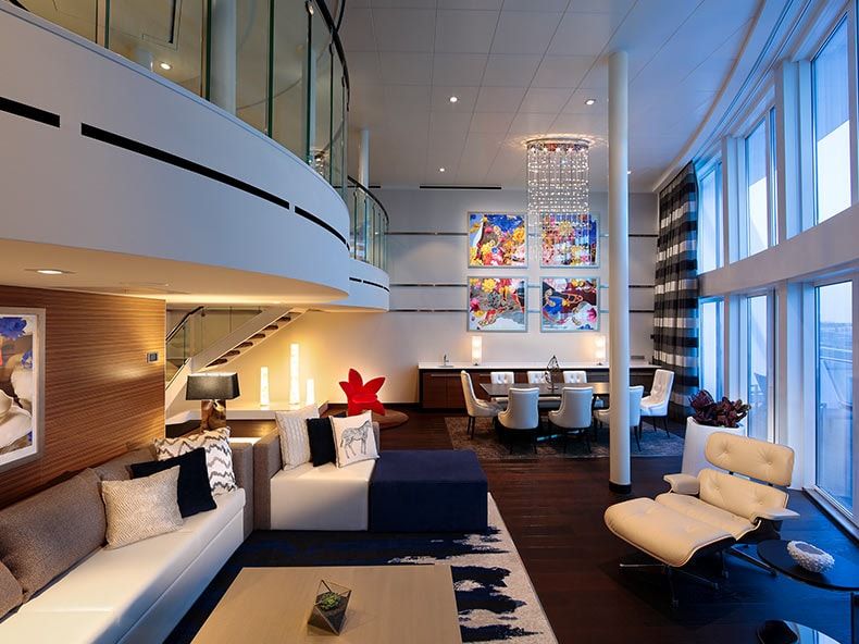 Odyssey of the Seas Royal Loft Suite (RL) living area, photo 2 of 8