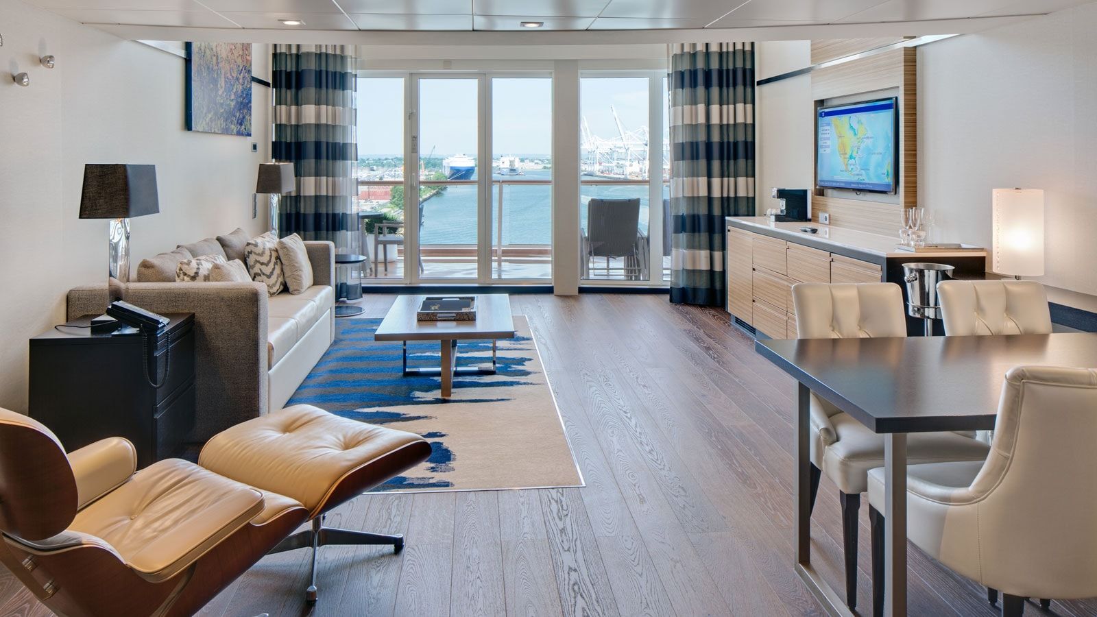 Ovation of the Seas Grand Loft Suite (GL) living area, photo 2 of 4