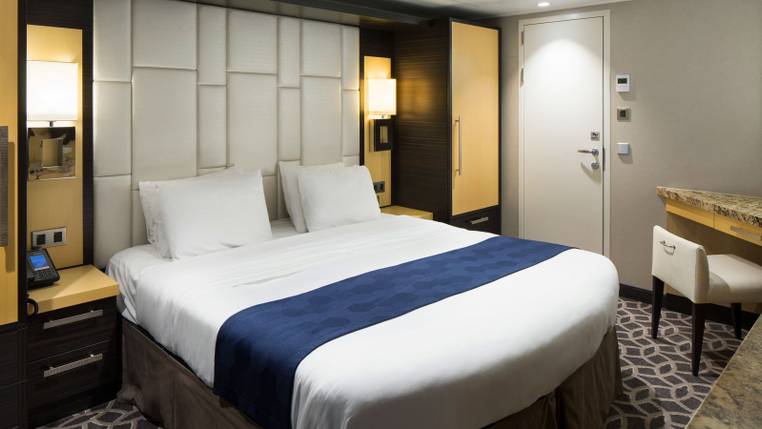 Ovation of the Seas Owner's Suite - 1 Bedroom (OS) bedroom