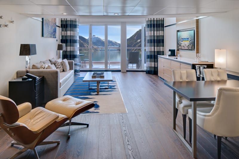 Ovation of the Seas Grand Loft Suite (GL) living area, photo 4 of 4