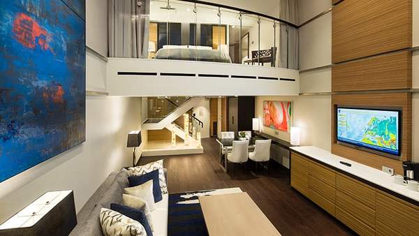 Quantum of the Seas Sky Loft Suite (SL) living area, photo 1 of 4