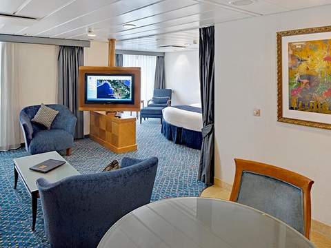 Radiance of the Seas Owner's Suite - 1 Bedroom (OS) living area, photo 1 of 3 Radiance of the Seas Owner's Suite - 1 Bedroom (OS) living area, photo 1 of 3