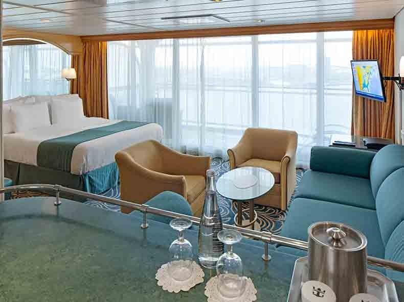 Rhapsody of the Seas Grand Suite - 1 Bedroom (GS) living area, photo 1 of 5