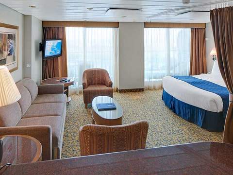 Serenade of the Seas Grand Suite - 1 Bedroom (GS) bedroom, photo 1 of 4