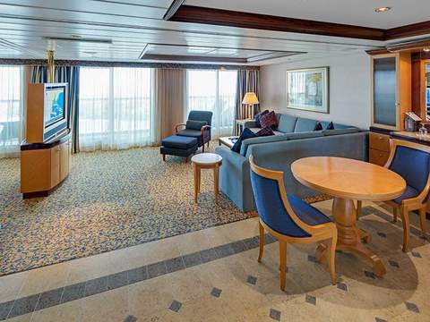 Serenade of the Seas Owner's Suite - 1 Bedroom (OS) living area, photo 1 of 3