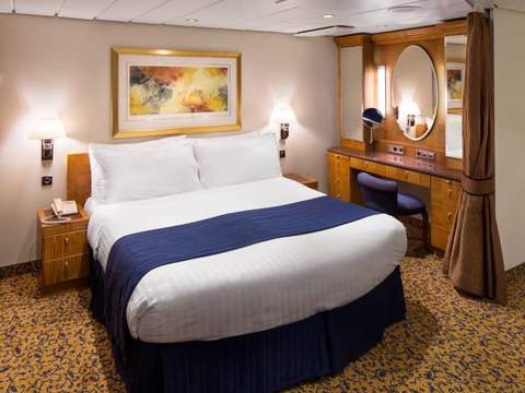 Serenade of the Seas Grand Suite - 1 Bedroom (GS) bedroom, photo 4 of 4
