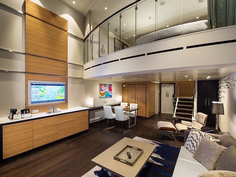 Spectrum of the Seas Grand Loft Suite (GL) living area, photo 1 of 4