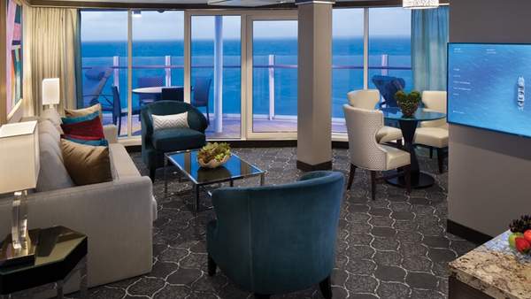 Symphony of the Seas Spacious AquaTheater Suite - 1 Bedroom (A3) living area, photo 1 of 2