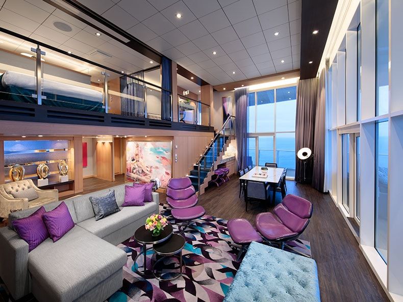 Symphony of the Seas Royal Loft Suite (RL) living area, photo 1 of 8