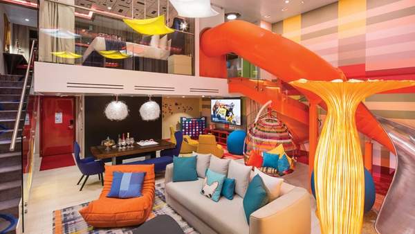 Symphony of the Seas Ultimate Family Suite (US) living area, photo 1 of 12