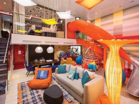 Symphony of the Seas Ultimate Family Suite (US) living area, photo 1 of 7
