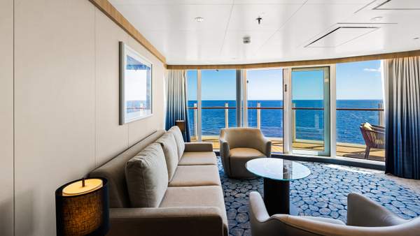 Utopia of the Seas Spacious AquaTheater Suite - 1 Bedroom (A3) living area, photo 1 of 3