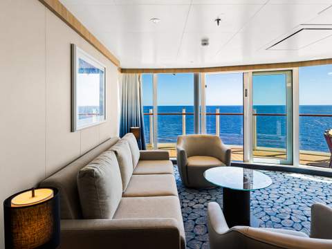 Wonder of the Seas Spacious AquaTheater Suite - 1 Bedroom (A3) living area, photo 1 of 3 Wonder of the Seas Spacious AquaTheater Suite - 1 Bedroom (A3) living area, photo 1 of 3