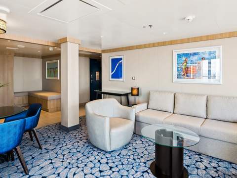 Wonder of the Seas Spacious AquaTheater Suite - 1 Bedroom (A3) living area, photo 2 of 3 Wonder of the Seas Spacious AquaTheater Suite - 1 Bedroom (A3) living area, photo 2 of 3