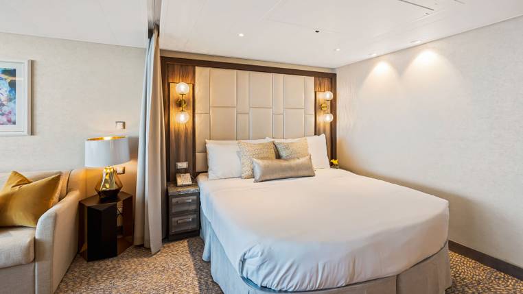 Utopia of the Seas Grand Suite - 1 Bedroom (GS) bedroom, photo 2 of 5
