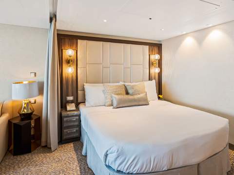 Utopia of the Seas Grand Suite - 1 Bedroom (GS) bedroom, photo 2 of 5 Utopia of the Seas Grand Suite - 1 Bedroom (GS) bedroom, photo 2 of 5