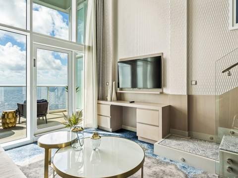 Wonder of the Seas Crown Loft Suite (L1) living area, photo 2 of 7