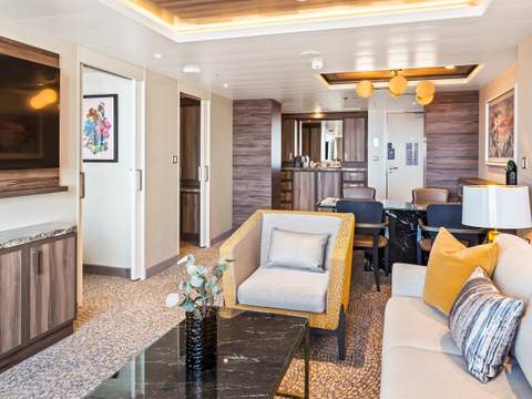 Utopia of the Seas Owner's Suite - 1 Bedroom (OS) living area, photo 2 of 4